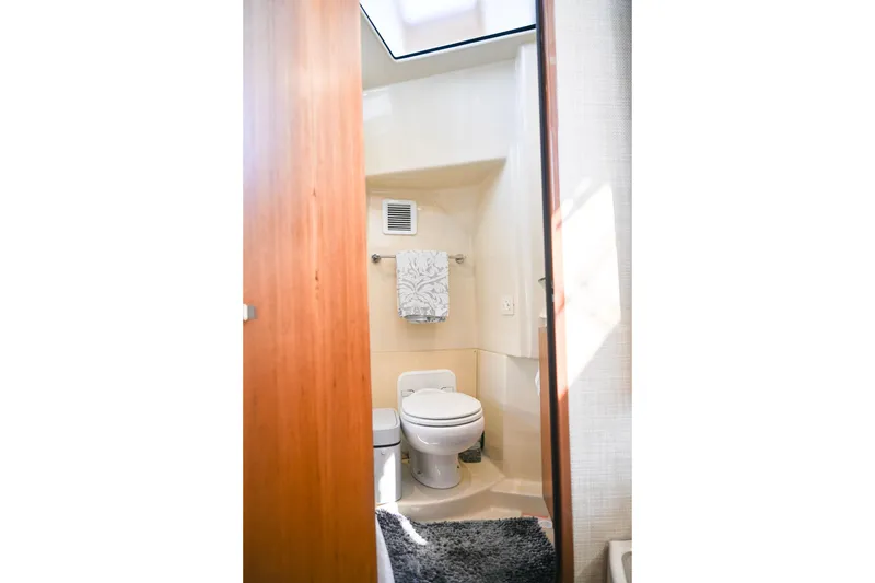 Slide: The Image of Bathroom interior of 2022 Ranger Tugs R-43 CB yacht, featuring modern amenities. - 56