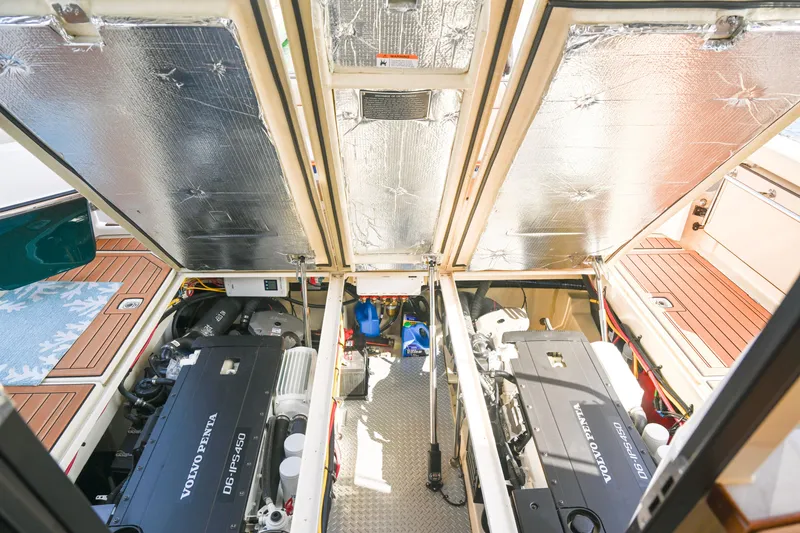 Slide: The Image of Engine compartment of 2022 Ranger Tugs R-43 CB with Volvo Penta engines. - 68