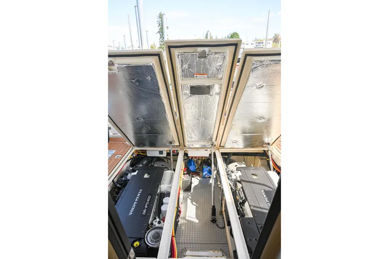 Slide: The Image of Engine compartment of 2022 Ranger Tugs R-43 CB with Volvo Penta engines. - 69