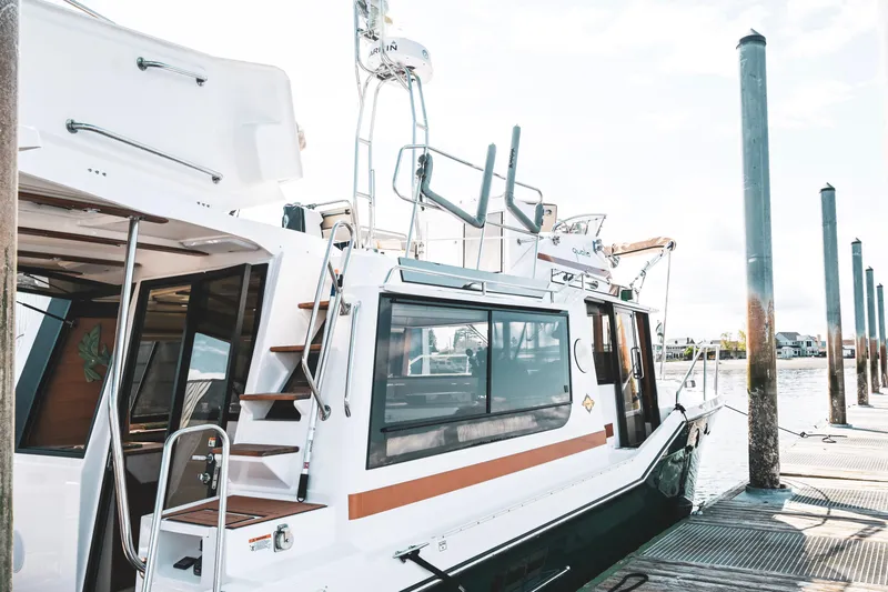 Slide: The Image of 2022 Ranger Tugs R-43 CB docked, showcasing sleek design and modern features. - 9