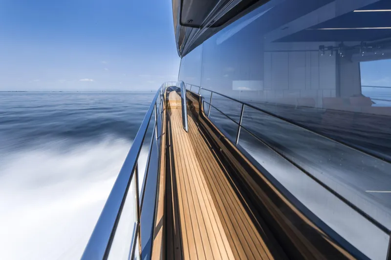 Slide: The Image of 2026 Cranchi Settantotto 78 yacht cruising on open water, sleek design and modern elegance. - 14