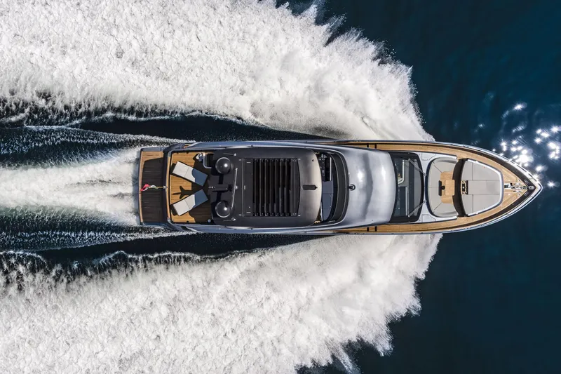Slide: The Image of Aerial view of 2026 Cranchi Settantotto 78 yacht cruising on open water. - 18