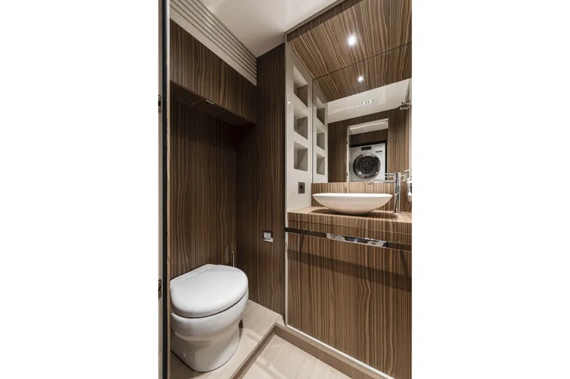Slide: The Image of Luxurious bathroom in 2026 Cranchi Settantotto 78 yacht with modern wood finish. - 27