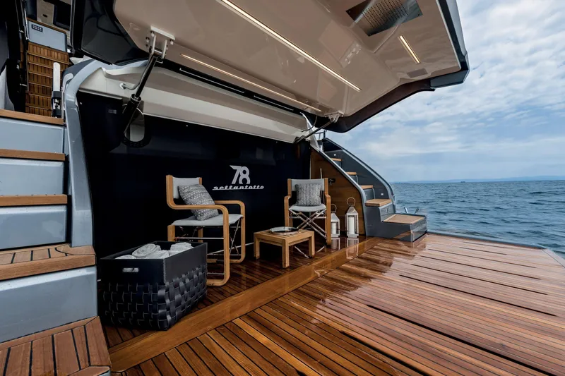 Slide: The Image of Luxury Cranchi Settantotto 78 yacht deck with elegant seating, 2026 model, ocean view. - 35