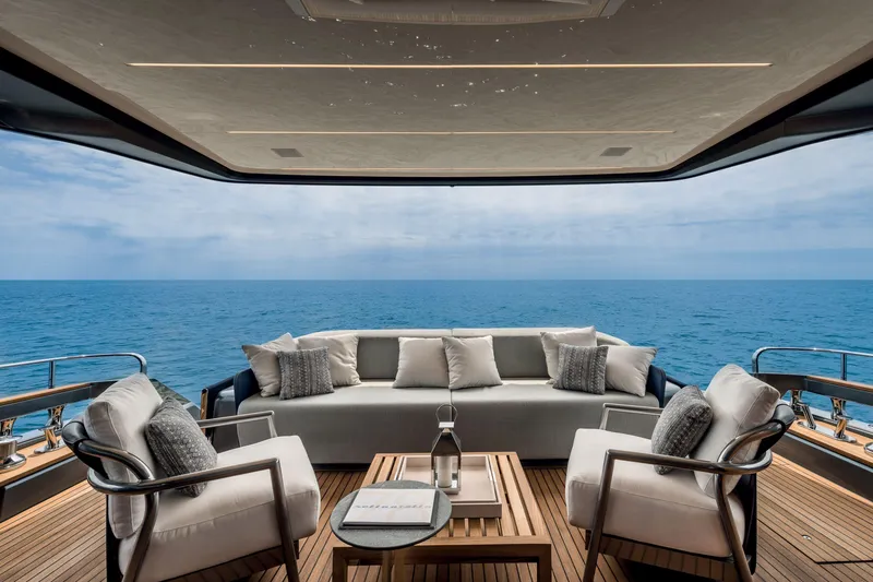 Slide: The Image of Luxurious 2026 Cranchi Settantotto 78 yacht deck with ocean view and elegant seating. - 39