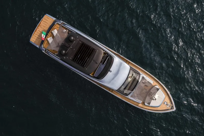 Slide: The Image of Aerial view of 2026 Cranchi Settantotto 78 yacht on open water. - 6