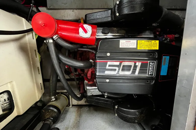 Slide: The Image of Engine compartment of a 1991 Carver 33 Aft Cabin Motor Yacht with Volvo Penta 501 engine. - 36