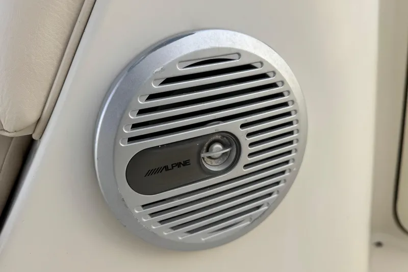 Slide: The Image of Alpine speaker on 2001 Sea Ray 240 Sundeck boat interior. - 29