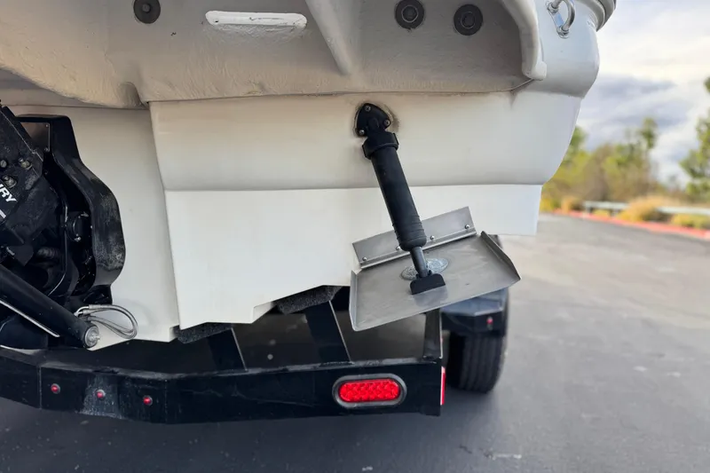 Slide: The Image of Rear view of a 2001 Sea Ray 240 Sundeck boat on a trailer. - 8