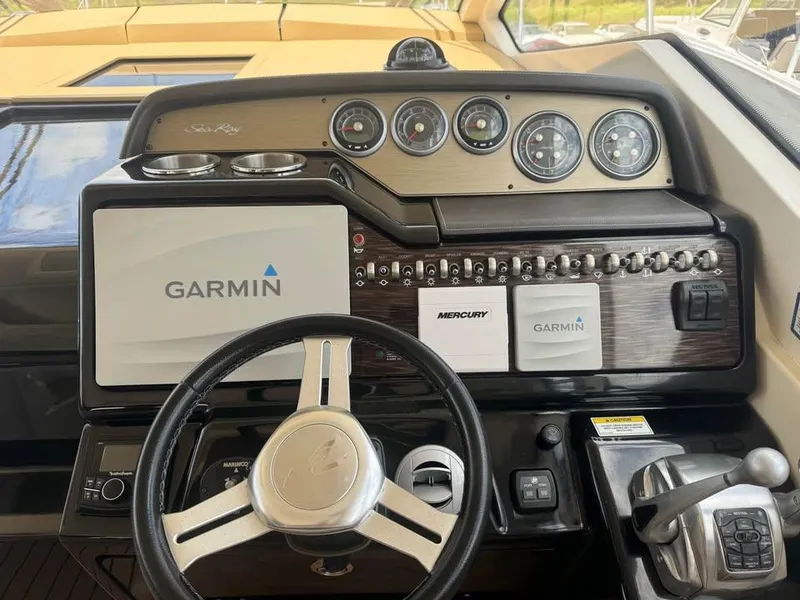 Slide: The Image of Cockpit of 2017 Sea Ray Sundancer 350 Coupe with Garmin navigation system. - 10