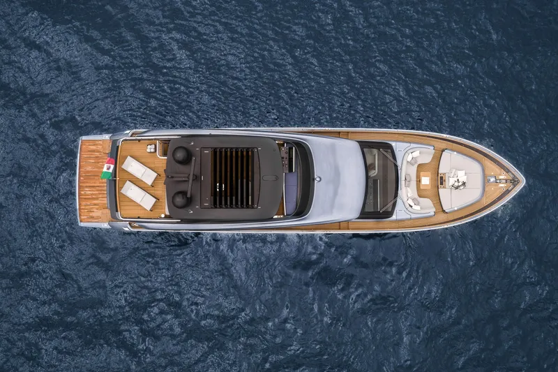 Slide: The Image of Top view of 2026 Cranchi Settantotto 78 yacht on open water. - 16