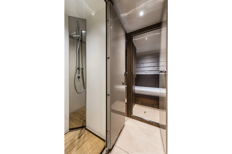 Slide: The Image of Luxurious bathroom interior of 2026 Cranchi Settantotto 78 yacht with modern shower design. - 28