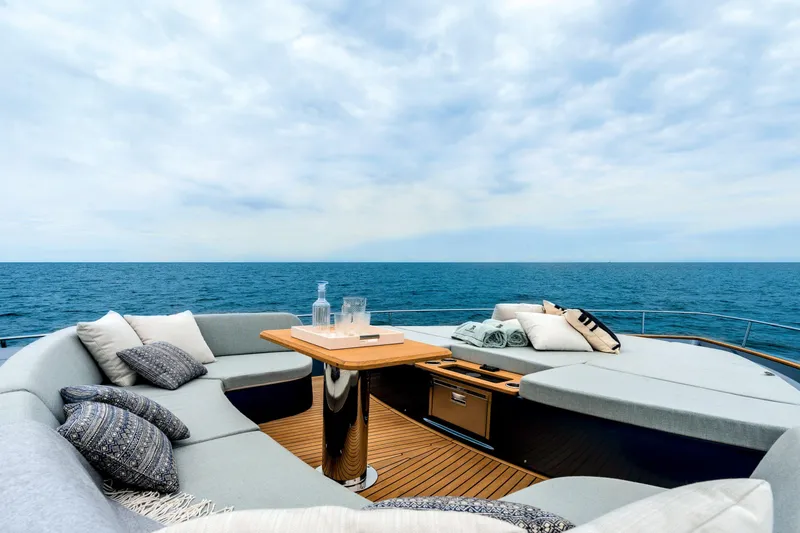 Slide: The Image of Luxurious 2026 Cranchi Settantotto 78 yacht deck with elegant seating and ocean view. - 34