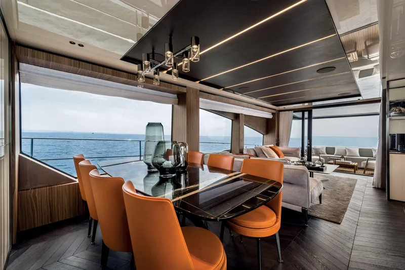Slide: The Image of Luxurious interior of 2026 Cranchi Settantotto 78 yacht with elegant dining and lounge area. - 37
