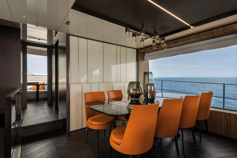Slide: The Image of Luxurious dining area on 2026 Cranchi Settantotto 78 yacht with ocean view. - 38