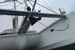 Slide: The Image of 2019 Lagoon 450 catamaran with rigging and netting details. - 41