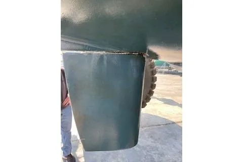 Slide: The Image of Close-up of a 2019 Lagoon 450 catamaran rudder on a dry dock. - 45