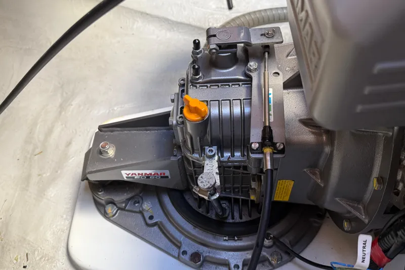 Slide: The Image of Yanmar engine component in a 2019 Lagoon 450 catamaran, showcasing mechanical details. - 55