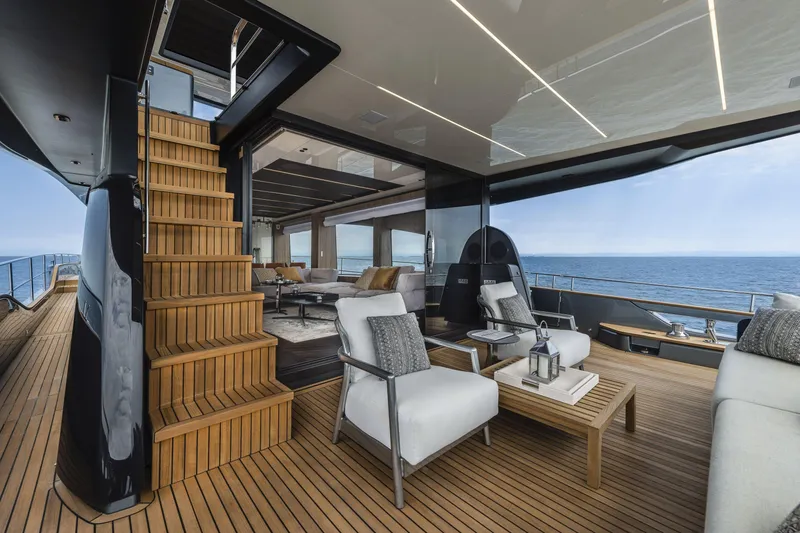 Slide: The Image of Luxurious 2026 Cranchi Settantotto 78 yacht interior with elegant seating and ocean view. - 11