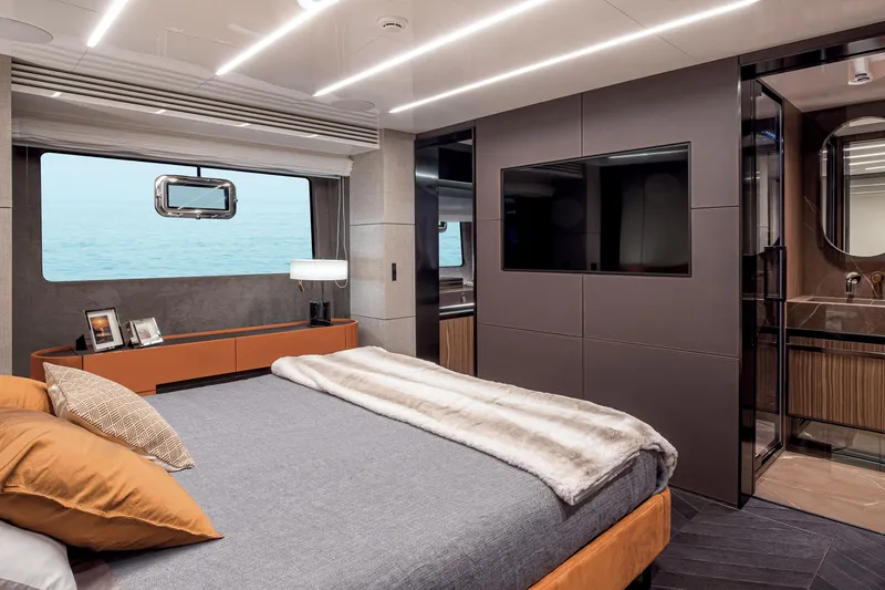 Slide: The Image of Luxurious bedroom interior of 2026 Cranchi Settantotto 78 yacht with ocean view. - 12