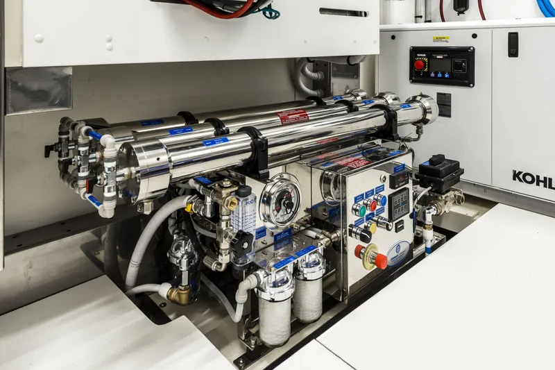 Slide: The Image of Engine room of 2026 Cranchi Settantotto 78 yacht with advanced machinery and controls. - 24