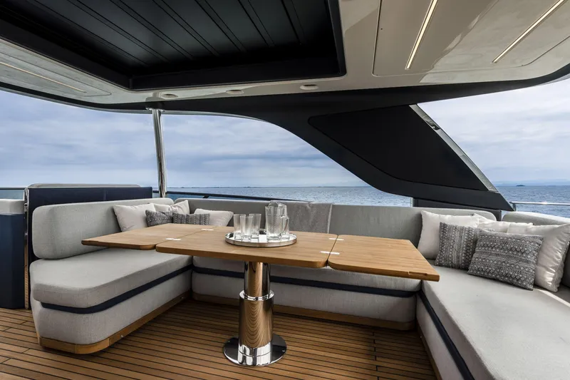 Slide: The Image of Luxurious 2026 Cranchi Settantotto 78 yacht interior with elegant seating and ocean view. - 30