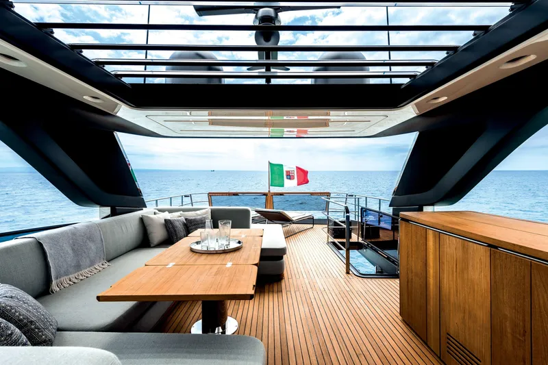 Slide: The Image of Luxurious 2026 Cranchi Settantotto 78 yacht interior with elegant seating and ocean view. - 31