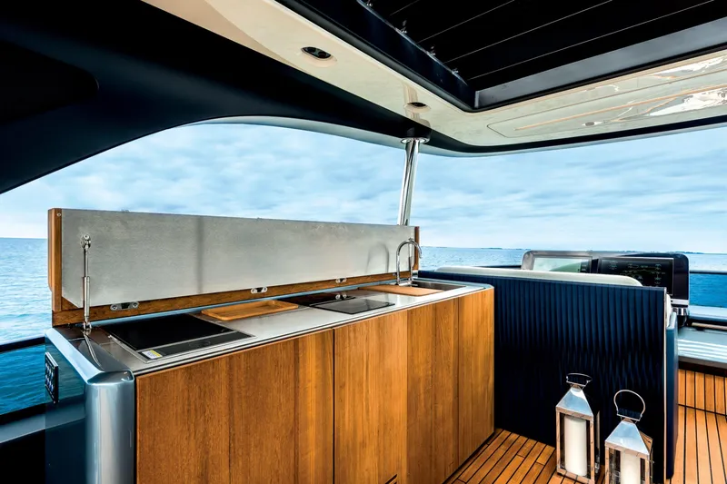 Slide: The Image of Luxurious 2026 Cranchi Settantotto 78 yacht kitchen with ocean view. - 33