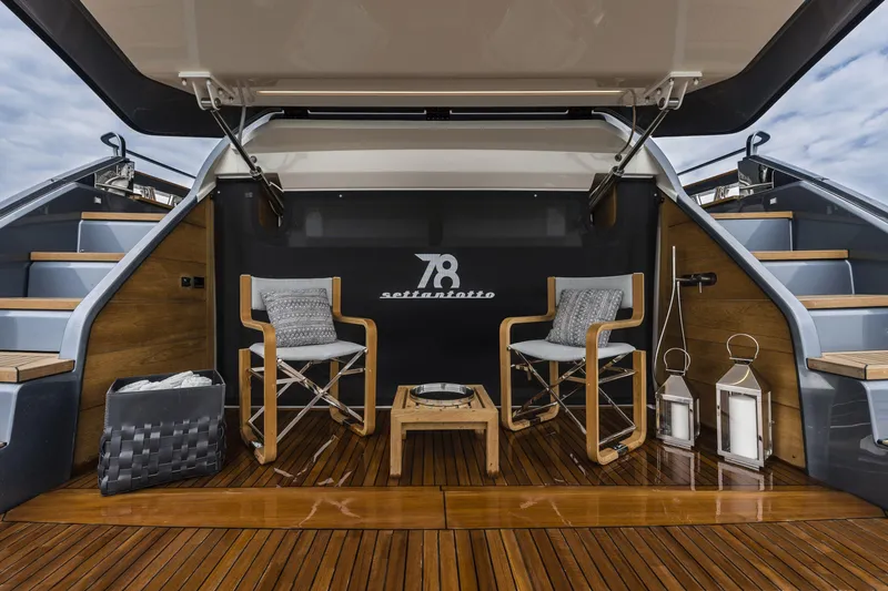 Slide: The Image of Luxurious 2026 Cranchi Settantotto 78 yacht deck with elegant seating and decor. - 7