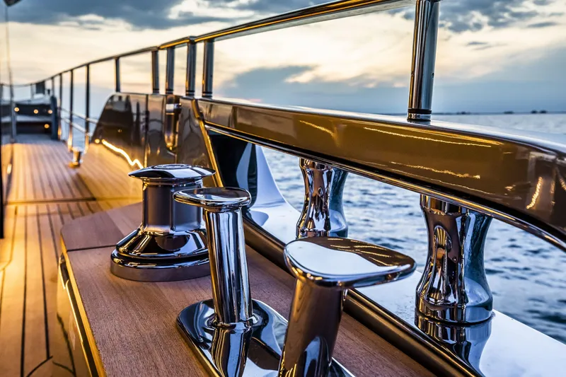 Slide: The Image of Luxurious Cranchi Sessantasette 67 yacht deck with polished chrome details, 2026 model. - 26