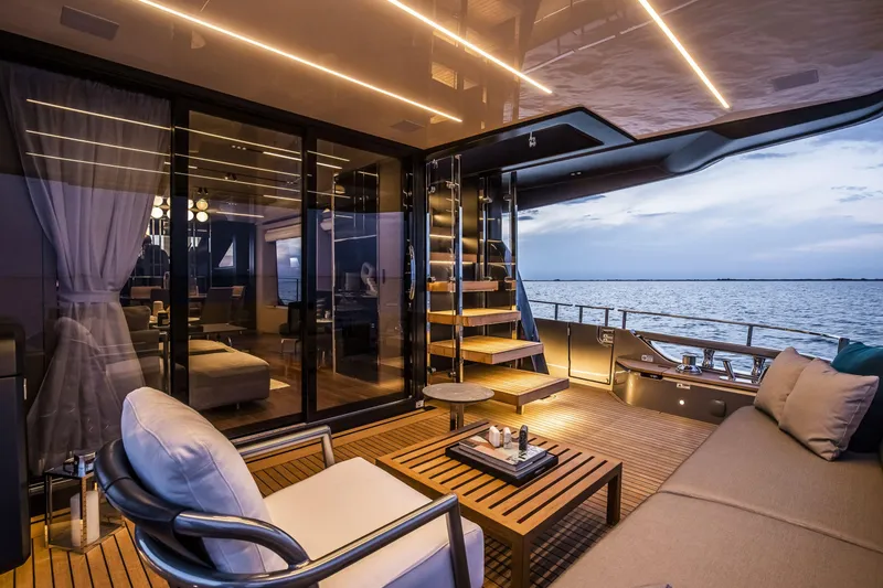 Slide: The Image of Luxurious 2026 Cranchi Sessantasette 67 yacht interior with elegant seating and ocean view. - 28