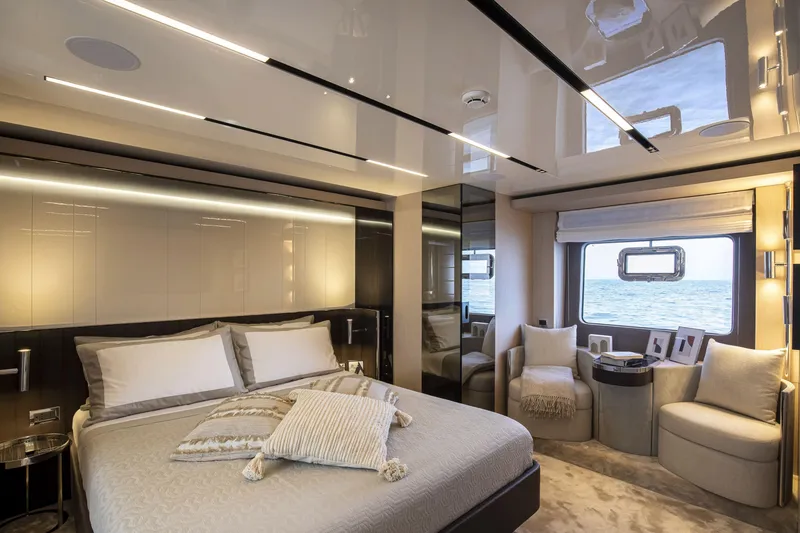 Slide: The Image of Luxurious bedroom interior of 2026 Cranchi Sessantasette 67 yacht with ocean view. - 29
