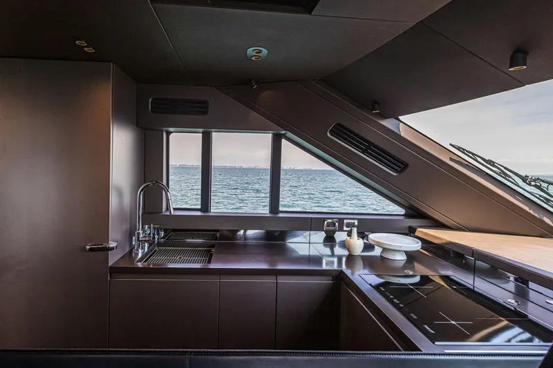 Slide: The Image of Luxurious kitchen interior of 2026 Cranchi Sessantasette 67 yacht with ocean view. - 31