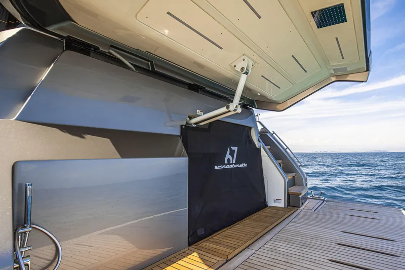 Slide: The Image of 2026 Cranchi Sessantasette 67 yacht with open deck, ocean view, and sleek design. - 34