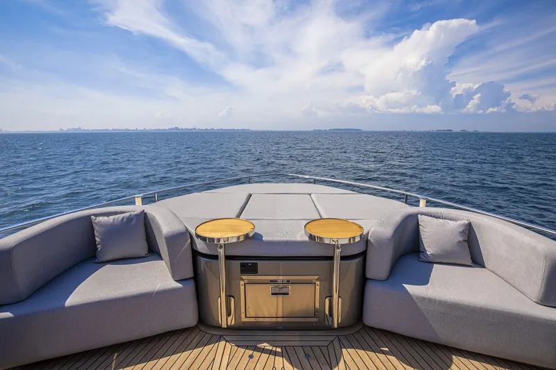 Slide: The Image of Luxurious deck of 2026 Cranchi Sessantasette 67 yacht with ocean view and seating area. - 35