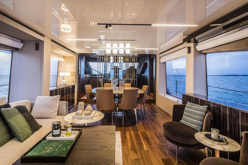 Slide: The Image of Luxurious interior of 2026 Cranchi Sessantasette 67 yacht with elegant dining area and ocean view. - 37