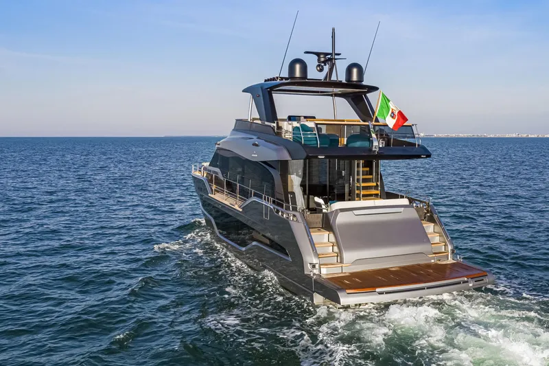 Slide: The Image of Luxury Cranchi Sessantasette 67 yacht cruising on open sea, 2026 model. - 4