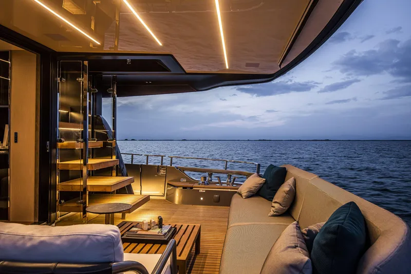 Slide: The Image of Luxurious 2026 Cranchi Sessantasette 67 yacht interior with elegant seating and ocean view. - 40