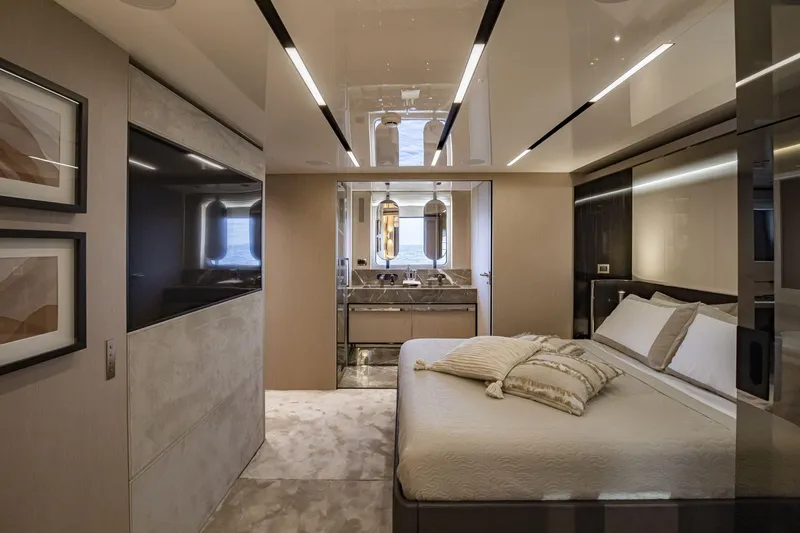 Slide: The Image of Luxurious interior of 2026 Cranchi Sessantasette 67 yacht with elegant bedroom and ensuite bathroom. - 43