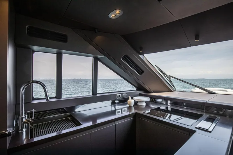 Slide: The Image of Luxurious kitchen interior of 2026 Cranchi Sessantasette 67 yacht with ocean view. - 45