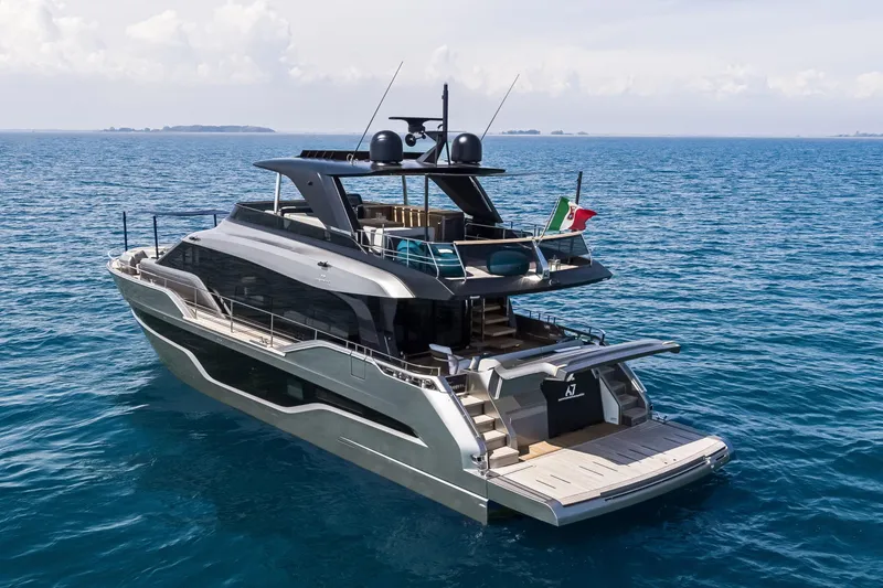 Slide: The Image of Luxury Cranchi Sessantasette 67 yacht cruising on open sea, 2026 model. - 46