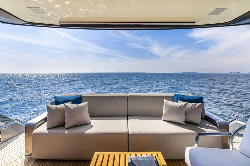 Slide: The Image of Luxurious Cranchi Sessantasette 67 yacht deck with ocean view, featuring comfortable seating, 2026 model. - 48