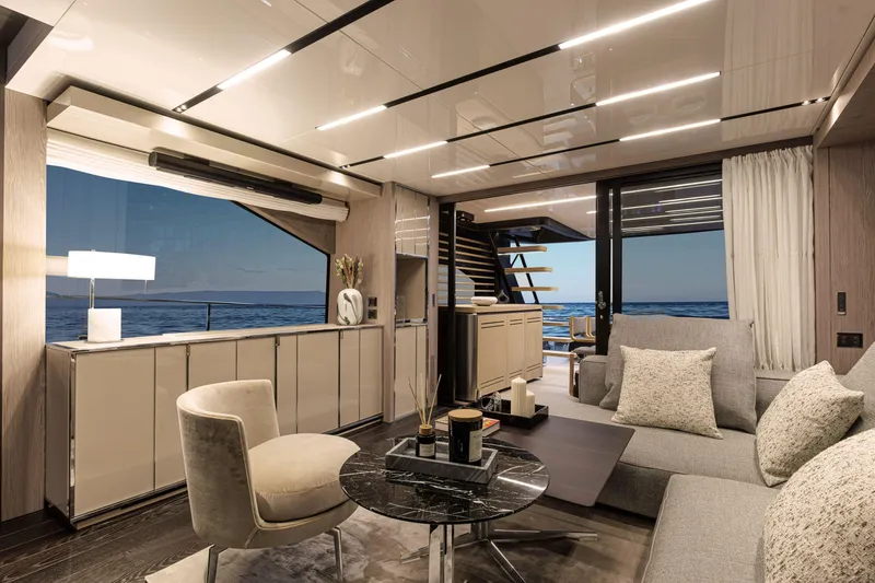 Slide: The Image of Luxurious interior of 2026 Cranchi Sessantasette 67 Corsa yacht with modern furnishings and ocean view. - 11