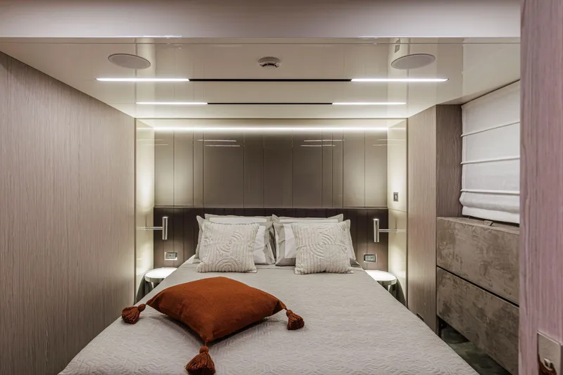 Slide: The Image of Luxurious bedroom interior of 2026 Cranchi Sessantasette 67 Corsa yacht, featuring modern design. - 14