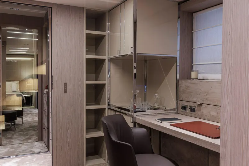 Slide: The Image of Luxurious interior of 2026 Cranchi Sessantasette 67 Corsa yacht with modern desk and chair. - 16