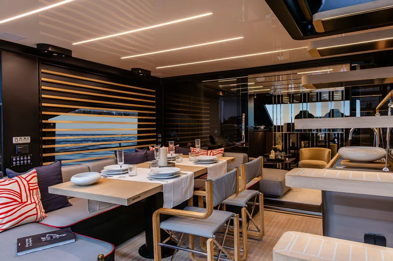 Slide: The Image of Luxurious interior of 2026 Cranchi Sessantasette 67 Corsa yacht with elegant dining area. - 19