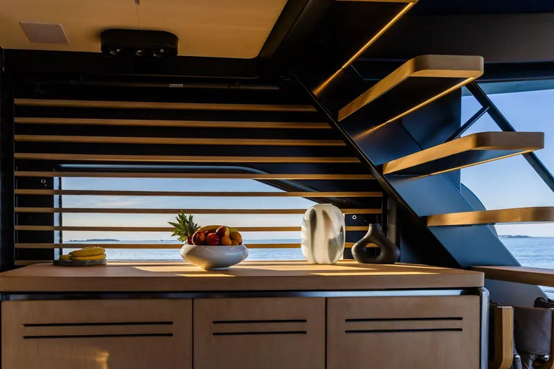 Slide: The Image of Luxurious interior of 2026 Cranchi Sessantasette 67 Corsa yacht with modern decor and ocean view. - 24