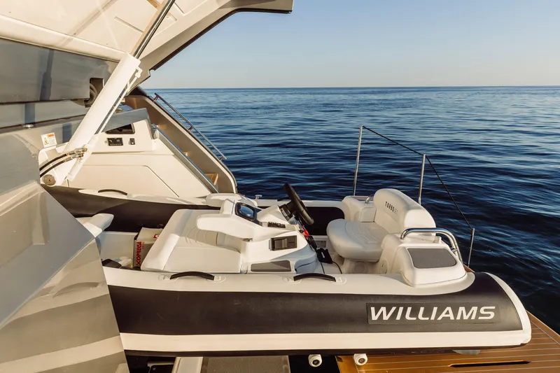 Slide: The Image of Luxury yacht Cranchi Sessantasette 67 Corsa with Williams tender on open sea, 2026 model. - 28