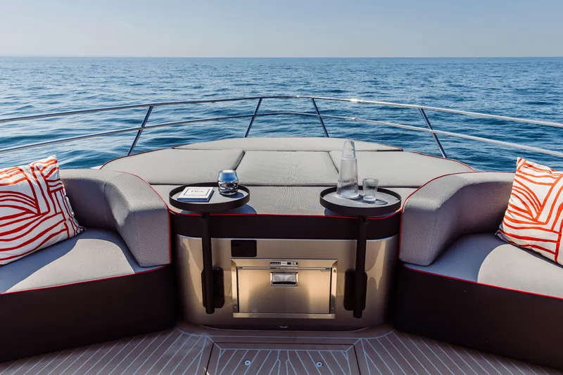 Slide: The Image of Luxurious seating area on 2026 Cranchi Sessantasette 67 Corsa yacht, with ocean view. - 29