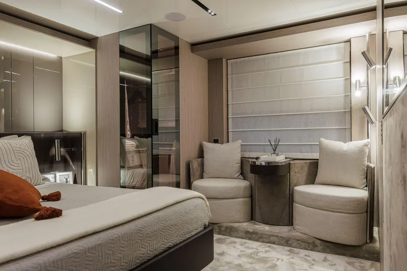 Slide: The Image of Luxurious interior of 2026 Cranchi Sessantasette 67 Corsa yacht bedroom with elegant seating. - 37